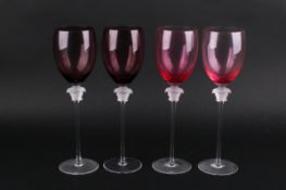 Two pairs of Versace Rosenthal, Medusa Lumiere wine glasses.