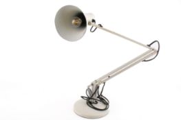 A mid-century, Herbert Terry & Sons cream anglepoise lamp. On circular base with fluted shade.
