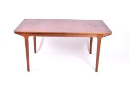 A mid-20th century McIntosh extending teak dining table.