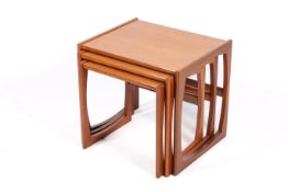 A mid-20th century G-Plan ' Quadrille' nest of three tables.