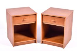 A pair of Stag 'Cantata' mid-century teak bedside tables. Single drawer with shaped handle above.