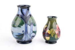 Two Moorcroft vases.