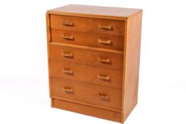 A mid-20th century G-Plan, E Gomme light oak chest of drawers.
