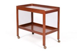 A 20th century, Gordon Russell two-tier mahogany trolley on wheels.