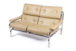 A 20th century Pieff 'Alpha' two-seater leather cream sofa.