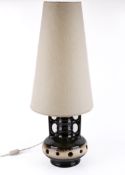 A mid-20th century West German, fat lava table lamp with shade.