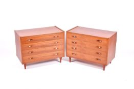 A pair of mid-20th century Danish teak chest of drawers, likely by Poul Hundevad.