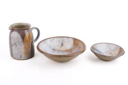 Three modern, stoneware studio pottery items of matching design.