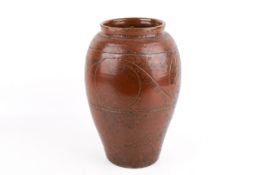 A large 20th century earthenware studio pottery brown vase.