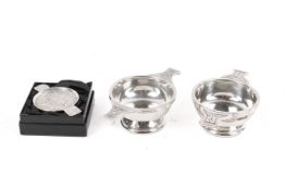 Three assorted white metal Quaich. One with box.
