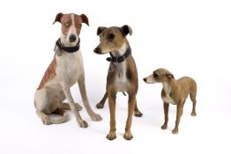A group of three assorted resin models of dogs (af). Including a two greyhounds and a whimpet.
