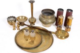 A collection of assorted brassware.