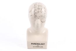 A reproduction 'Phrenology by L. N. Fowler' ceramic head.