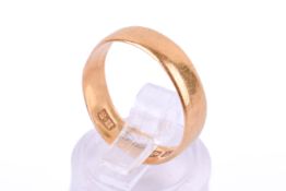 A 22ct gold wedding band. Hallmarked, width 4.5mm, size O, weight 3.1g.