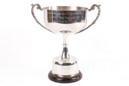 A 21st century Highridge Christmas Fatstock Show silver plated twin handled trophy.
