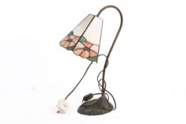A Tiffany style table lamp.