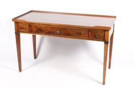 A 20th century Georgian style oak writing table or desk with three drawers.
