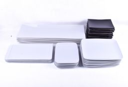 A collection of Typhoon and other ceramics tableware. Including black rectangular dishes, etc.