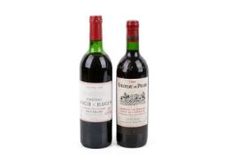 Two bottles of 1986 red wine.