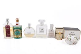 A group of assorted designer cosmetic. Including Chanel No. 5 L'eau de toilette, etc.