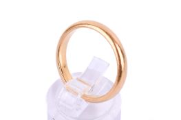 A 22ct gold wedding band. D-form, hallmarked, size O, weight 5g.