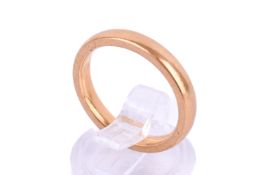 A 22ct gold wedding band. Size L1/2, weight 6.1g.