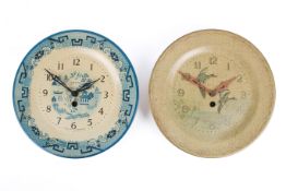 Two Smith's wall clockwork clocks in the form of plates.