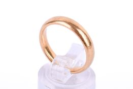 A 22ct gold wedding band. Size M, weight 5.9g.