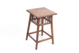 A vintage Arts and Crafts style oak side table.