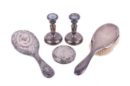 Five silver and white metal items.