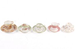 Five 19th and 20th century century teacups and saucers.