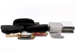 A group of five assorted folding collector's knives.