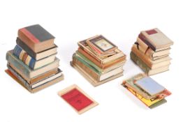 A collection of assorted books. Including Lt. Col. J.H. Williams.