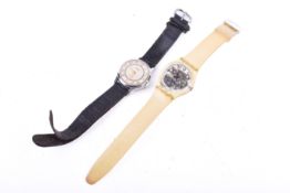 Two wristwatches.