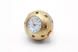 A gold plated Emka pendant watch.