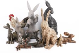 A collection of assorted models of hares plus a cast metal cockerill doorstops.