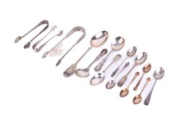 A collection of assorted Georgian and later silver spoons and sugar tongs.