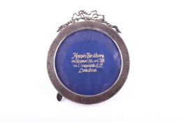 A Mappin Brothers silver mounted round picture frame.