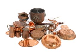 A large quantity of assorted copper, metal and brass. Including moulds and a warming pan, etc.