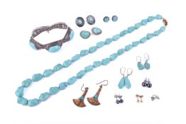 A collection of assorted turquoise jewellery.