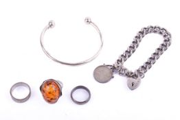 A small group of silver jewellery.