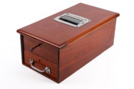 A vintage mahogany shop cash register with keys. Having a hinged top and drawer below.