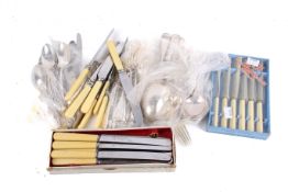 A collection of assorted silver plate flatware.