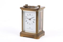 A modern Matthew Norman carriage clock, with fitted box, key and instructions.