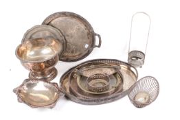 A box of assorted silver plated items. Including a Georgian coin inlaid punch bowl, trays, etc.