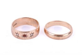 A pair of hallmarked 9ct gold gents rings.