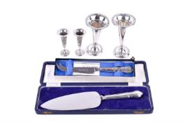 Six silver and white metal items.