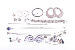 A small group of silver and white metal jewellery.