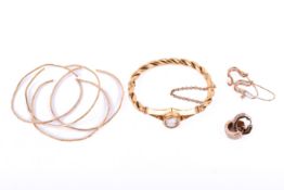 A small group of yellow metal jewellery and pieces.