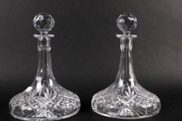 A pair of modern cut glass ship's decanters, with stoppers.